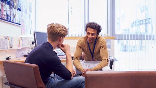 Mental Health Nursing student speaking with a teenager