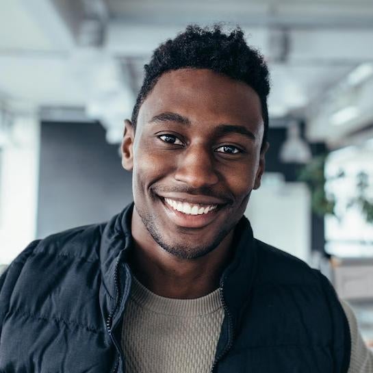 Education and Wellbeing student smiling at camera