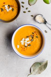 A bowl of pumpkin soup. 