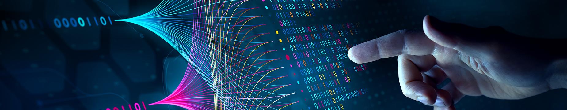 A hand points at a computer screen displaying a line of data, emphasizing the information presented.